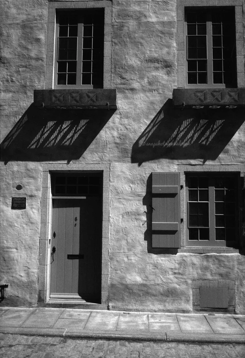 Façade Circa 1608 ish shot on Ilford PanF Plus 50 with a Nikon S32000Edition, developed at Home / Self-Developed, by Anthony
