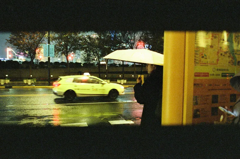 Waiting for taxi shot on Cinestill 800T with a Canon EOS Kiss III L, developed at Film Park, by Andika