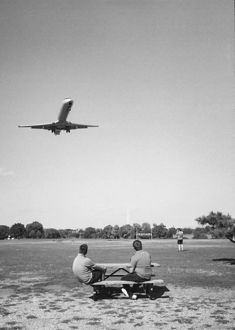 Plane spotting shot on Ilford FP4 Plus 125 with a Olympus Pen EE-2, developed at Dominion Camera, by Lucy Mueller