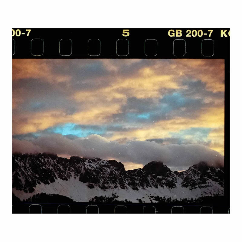 Clouds over clouds shot on Kodak Gold 200 with a Canon EOS 1000, developed at DevbyJannis, by Alessandro Benevento