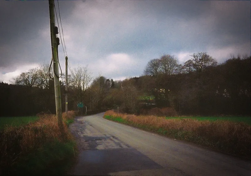 Countryside Road shot on Kodak ColorPlus 200 with a pentax 17, developed at Max Speilmann, by Nigel Owen