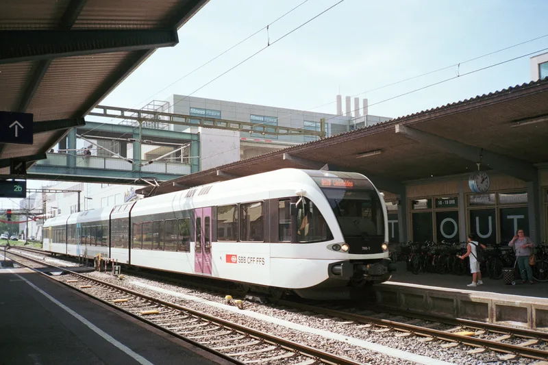 Stadler GTW (RABe 526 / GTW 2/8) shot on Fujifilm FujiColor C200 with a Konica Genba Kantoku 35WB, developed at MeinFilmLab, by railsonfilm