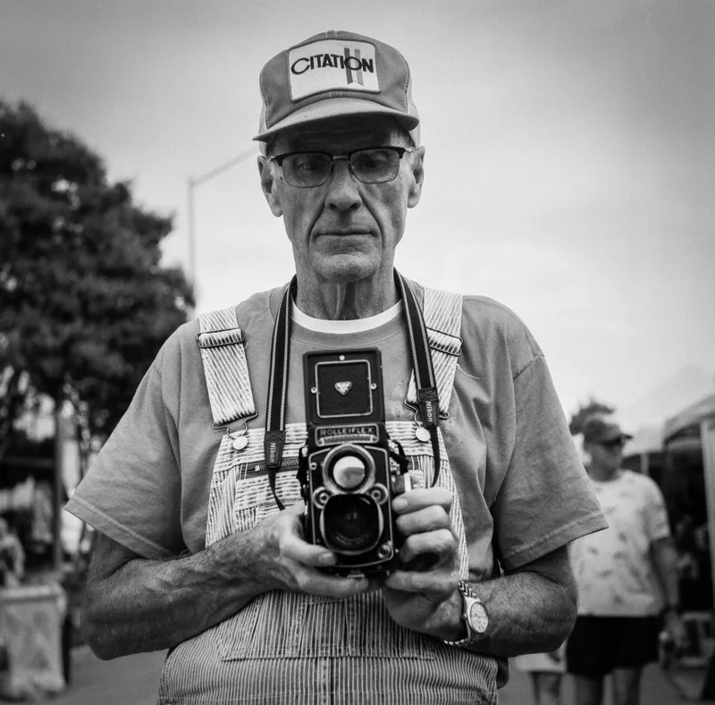 A Photographer shot on Cinestill BWXX 200 with a Yashica C, developed at Fort Worth Camera, by Tom