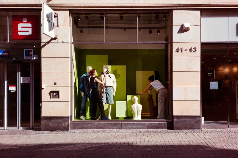 Window Shopper shot on Kodak UltraMax 400 with a Leica CL, developed at Optik Oldschool, by Mateusz Goliath