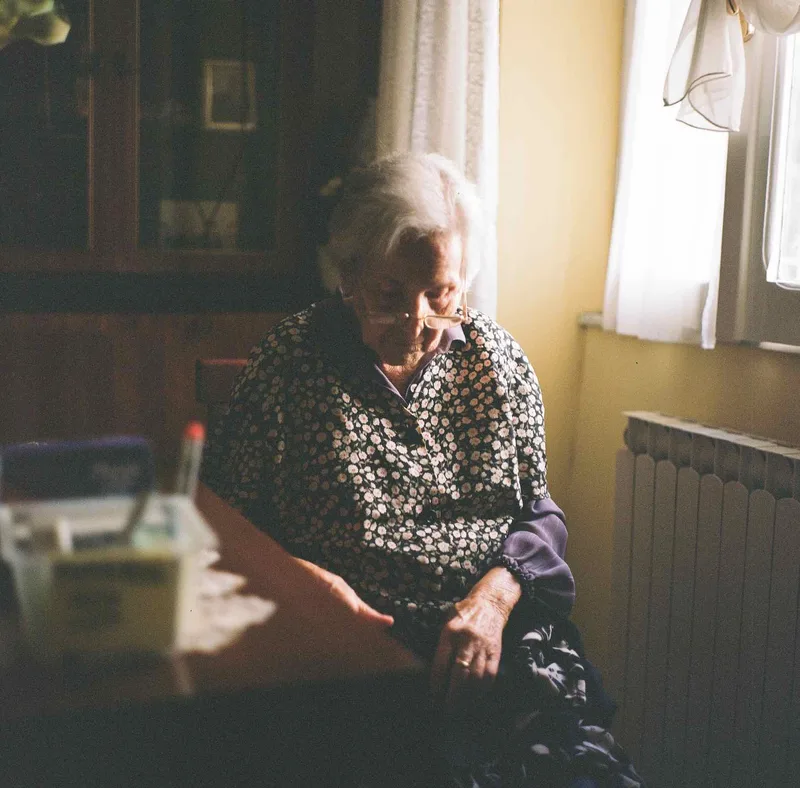 grandma sewing shot on Kodak Portra 400 with a Zenza Bronica S2A, developed at Nation Photo, by damiano
