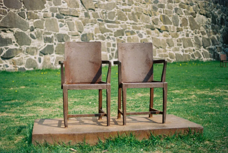 The empty chairs shot on Kodak ColorPlus 200 with a Olympus OM-2, developed at Oslo Foto, by Emil O.G Ryberg
