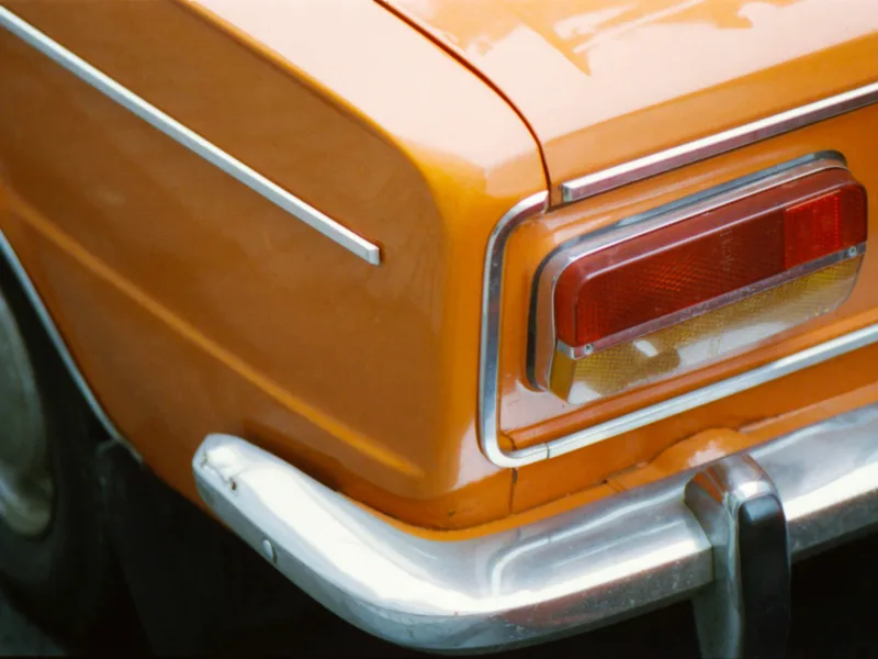 Orange Oldtimer shot on Cinestill 800T with a Nikon FM2n, by Frank