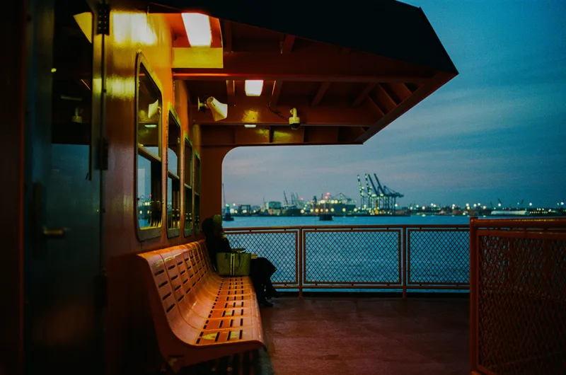 Alone and cold on the SI ferry shot on Kodak Portra 800 with a Nikon FM2n, developed at Reformed Film Lab, by Ayush