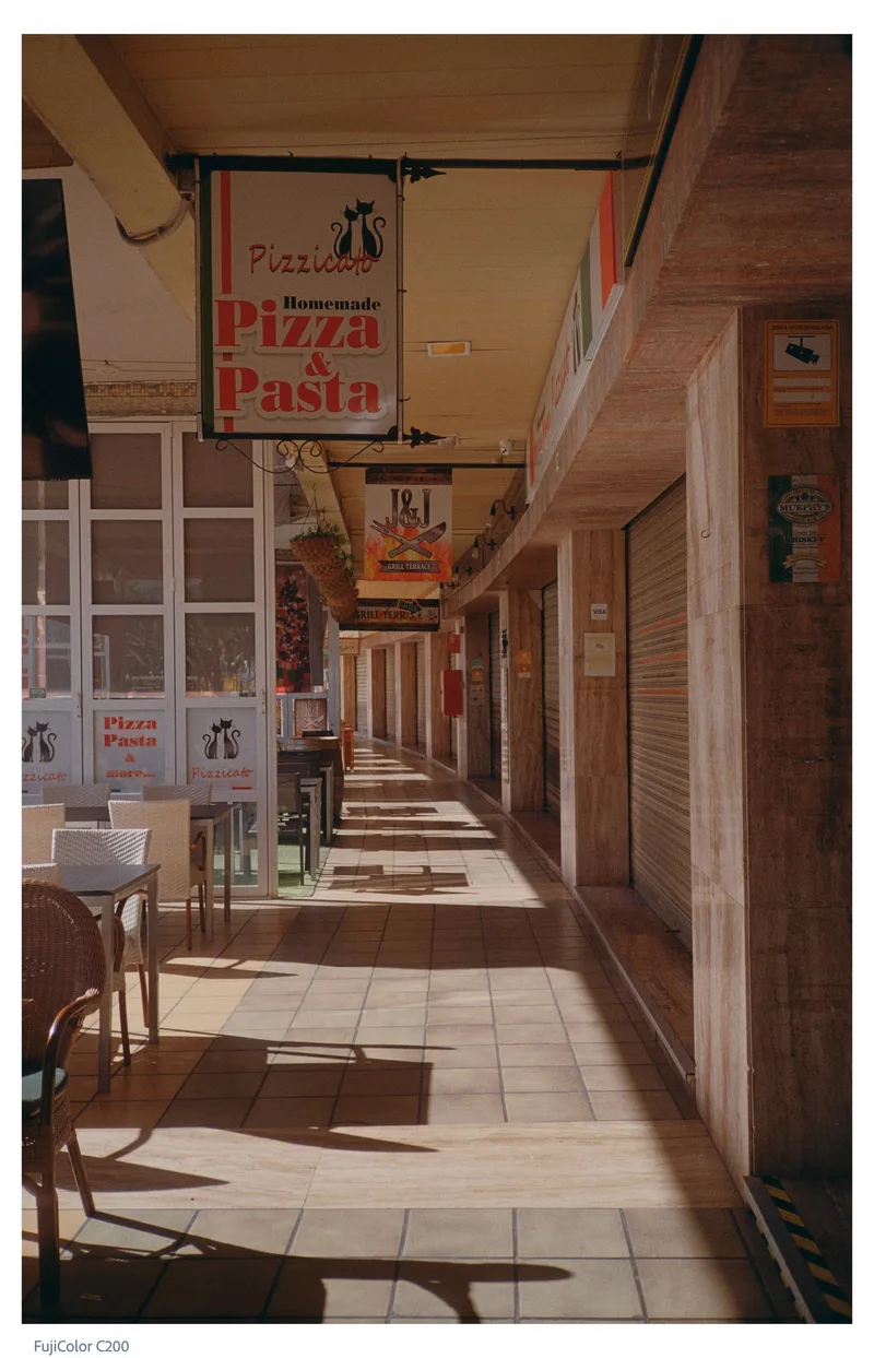 Pizza & pasta shot on Fujifilm FujiColor C200 with a Yashica T5, developed at Silbersalz 35, by Andreas Wirstam