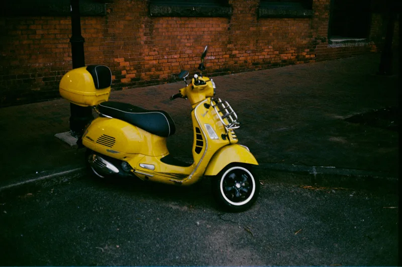 Scooter shot on Kodak Gold 200 with a Yashica ElectroCCNWide, developed at Photo60, by Jacob
