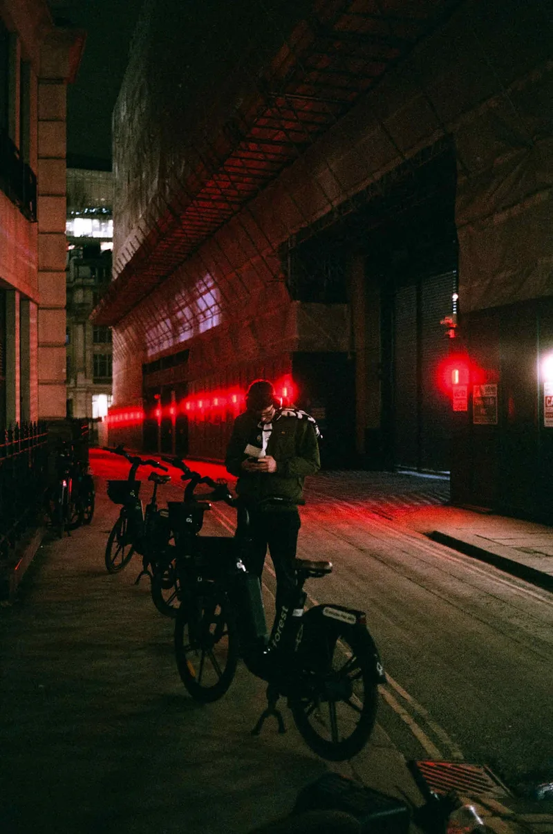 Red lights in the city shot on Fujifilm Superia X-TRA 400 with a Contax G1, developed at London Film Lab, by Jack Caley
