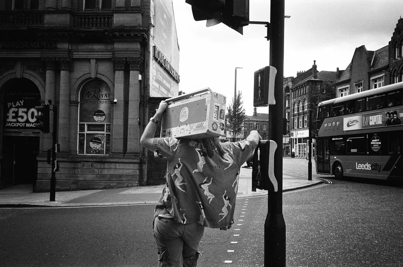 Waiting to cross shot on Kodak Double-X 5222 with a Olympus XA2, developed at Take It Easy, by Kers