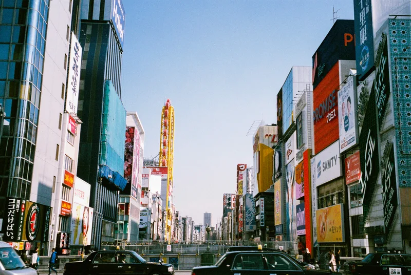 Daytime Dotonbori shot on Fujifilm Superia X-TRA 400 with a Pentax Espio 738, developed at Your Local Film Lab, by Floyd