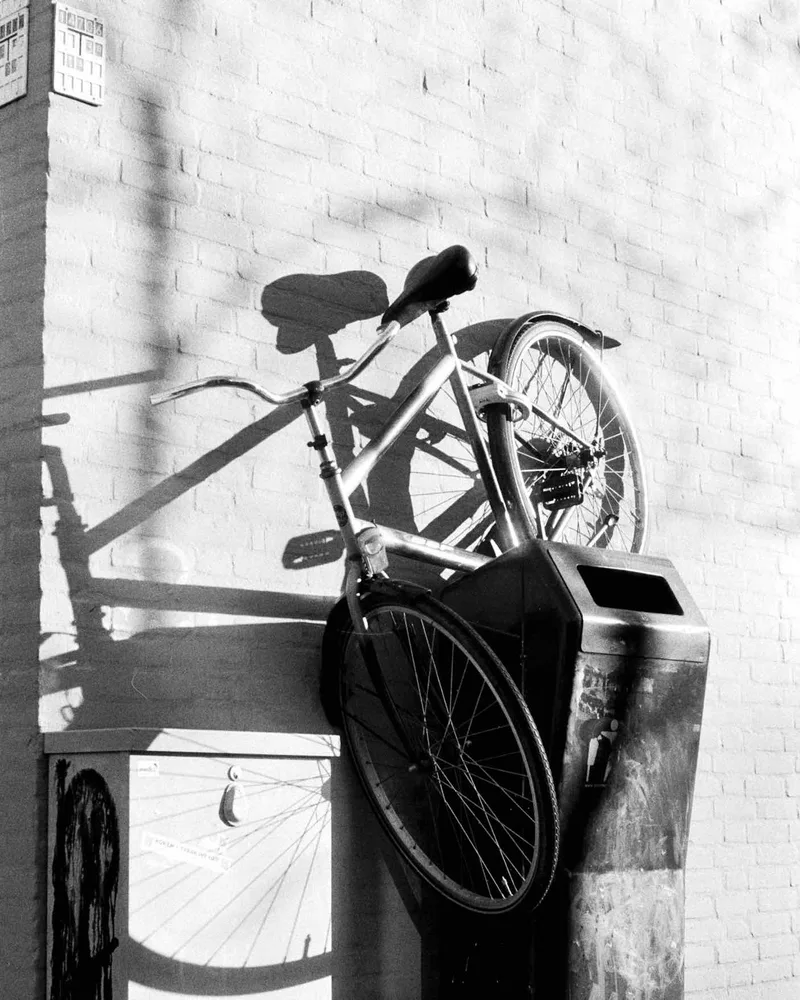 Bike & Bin shot on Foma Fomapan 400 Action, developed at Analog Space, by Amarthya Dida