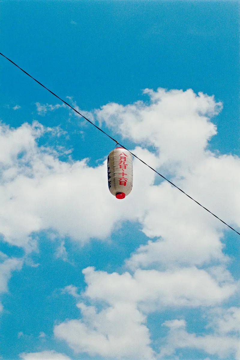 Lamp & Clouds shot on Kodak Portra 400 with a Canon A-1, developed at CAMERA LAND Yaotomi, by Chillsburg