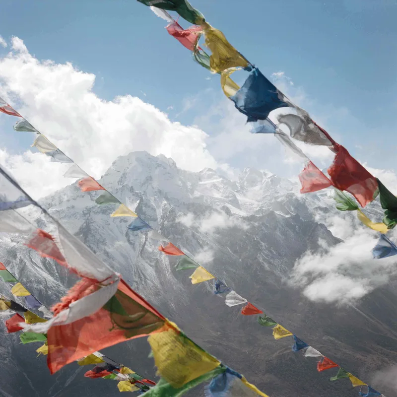 Prayer flags shot on Kodak Portra 400 with a Rolleiflex 2.8F, by Jun Ma