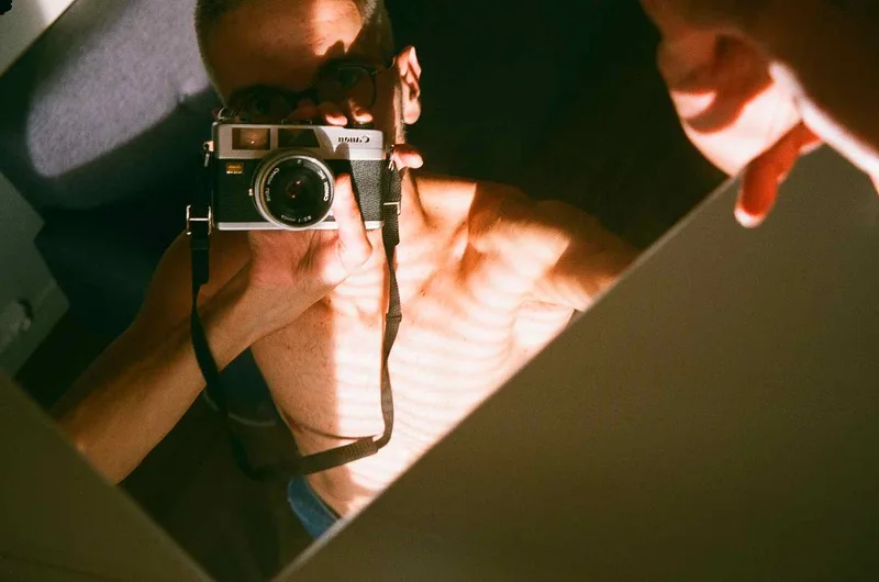 squared shot on Fujifilm Superia X-TRA 400 with a Canon Canonet 28, developed at Nation Photo, by damiano