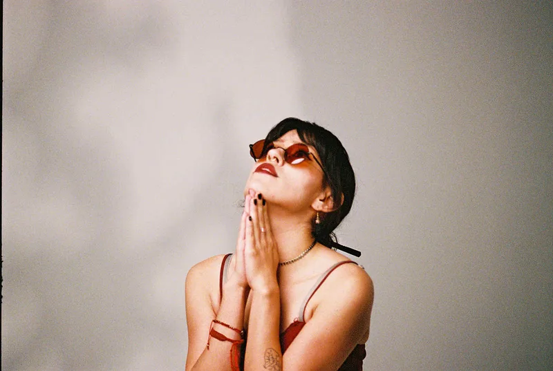 Praying shot on Kodak Portra 400 with a Minolta X-370S, developed at Phoenix Photo Lab, by 35mm_of_Alex
