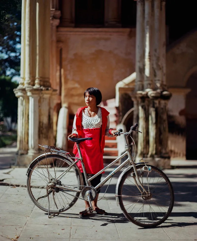 The young girl and the bicycle shot on Kodak Portra 400 with a Pentax 6x7 MLU, developed at LERT’s, by Kuortam