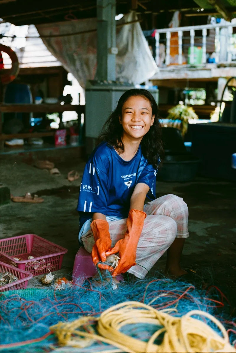 Koh Mook Crab Girl shot on Fujifilm FujiColor 100 with a Contax G2, developed at Rapid Eye, by Alan Hill