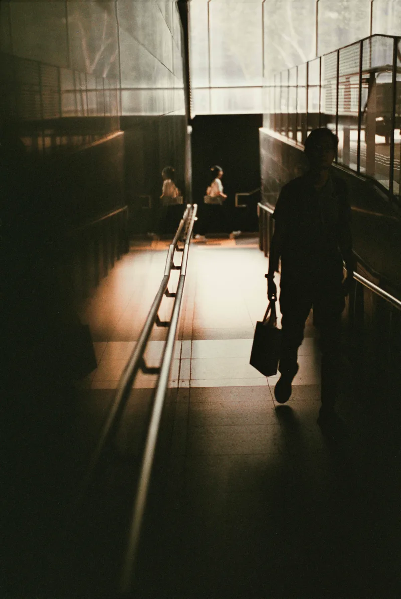 Walking to and away shot on Lucky C200 with a Leica M6 Classic, developed at Triple Mini Lab, by Jonathan H