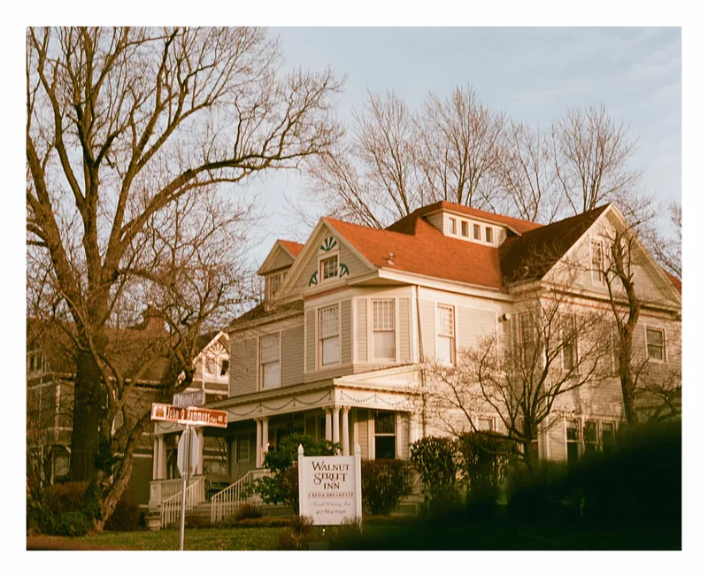 the neighborhood inn shot on Fujifilm Superia X-TRA 400 with a Pentax IQZoom, by kenny