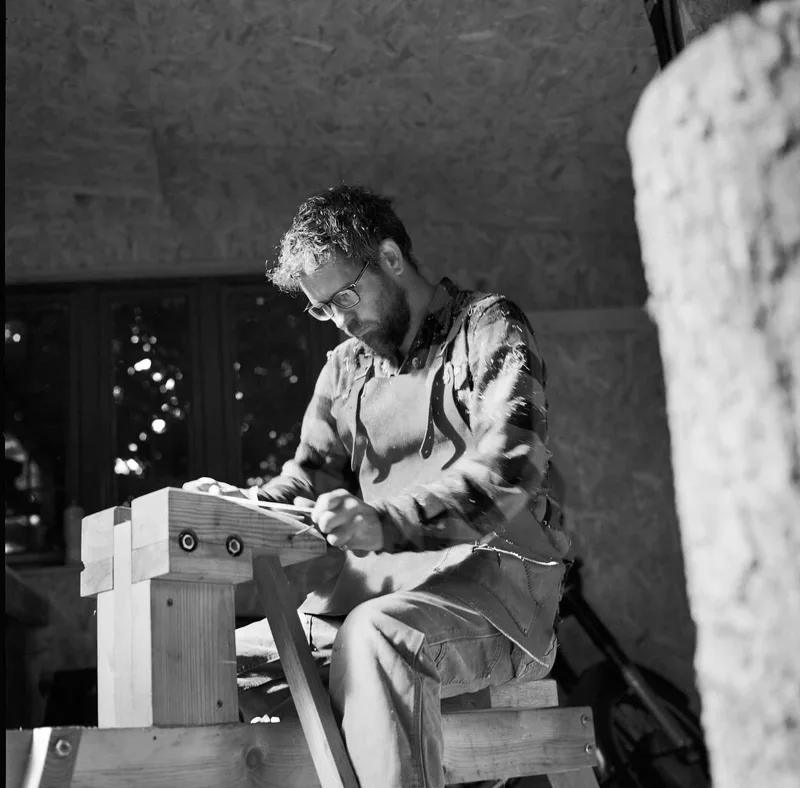 A woodsmith in action shot on Ilford HP5 with a Hasselblad 500CM, developed at AG Photolab, by Rick Davy