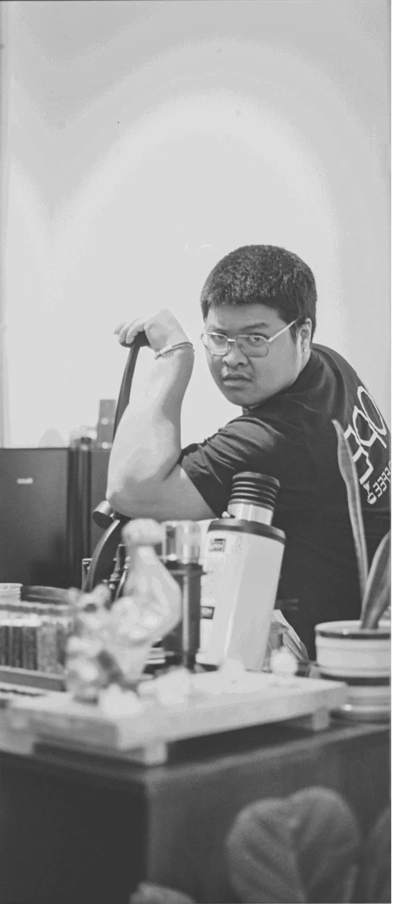 Nong, The Barista shot on Ilford XP2 Super 400 with a Hasselblad 500C, developed at Laolangfilm, by Sonethanou Xayakone