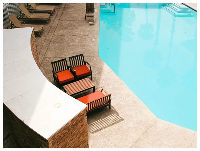 Poolside shot on Flic Film Elektra with a Pentax K1000, developed at Wilson Camera, by Trevor McGoldrick