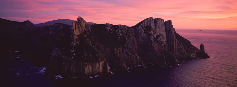 CAPE PILLAR SUNRISE, TASMAN NATIONAL PARK, TASMANIA shot on Fujifilm Velvia 50 with a Hasselblad Xpan, developed at Home / Self-Developed, by Will Camp