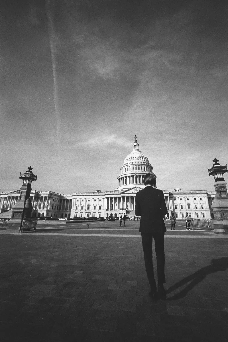 Money talks, and bullshit walks. shot on Kodak Tri-X 400 with a Voigtländer Bessa L, developed at Norwich Camera Co, by Patrick Hennessy
