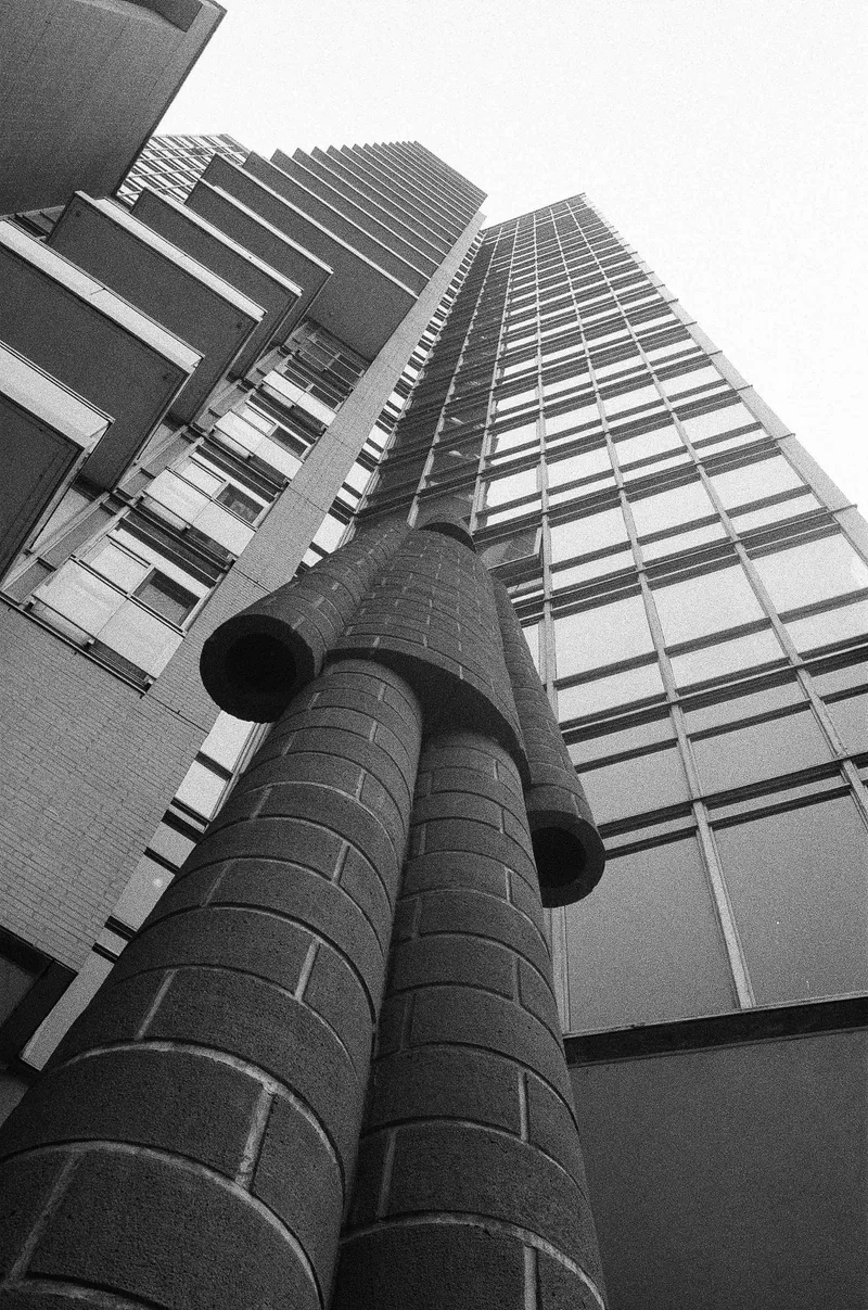 City Person shot on Ilford Kentmere Pan 400 with a Nikon FM2n, developed at 60 Minute Photo Lab, by BrindleGeek