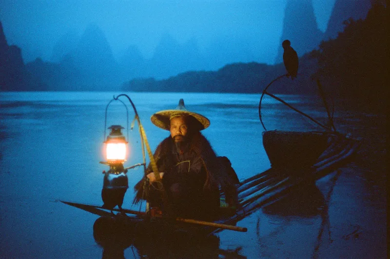 Cormorant Fisherman shot on Cinestill 800T with a Nikon F100, developed at Colorluxe Express, by Reggie