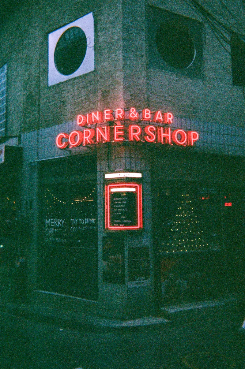 The corner shop shot on Fujifilm Superia X-TRA 400, developed at Filmlog, by Guesty