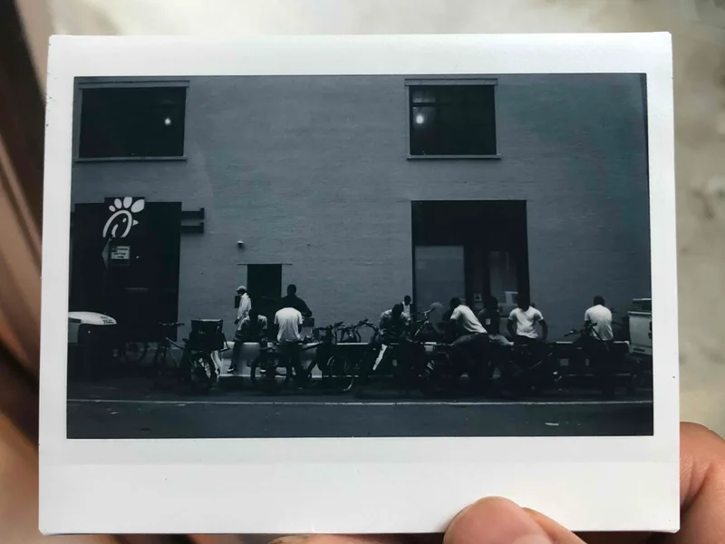 NYC delivery shot on Fujifilm Instax Wide Monochrome with a Fujifilm Instax Wide 300