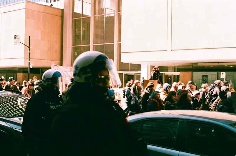 Protest shot on Lucky C200 with a Pentax MV, developed at Studio Argentique, by Vince