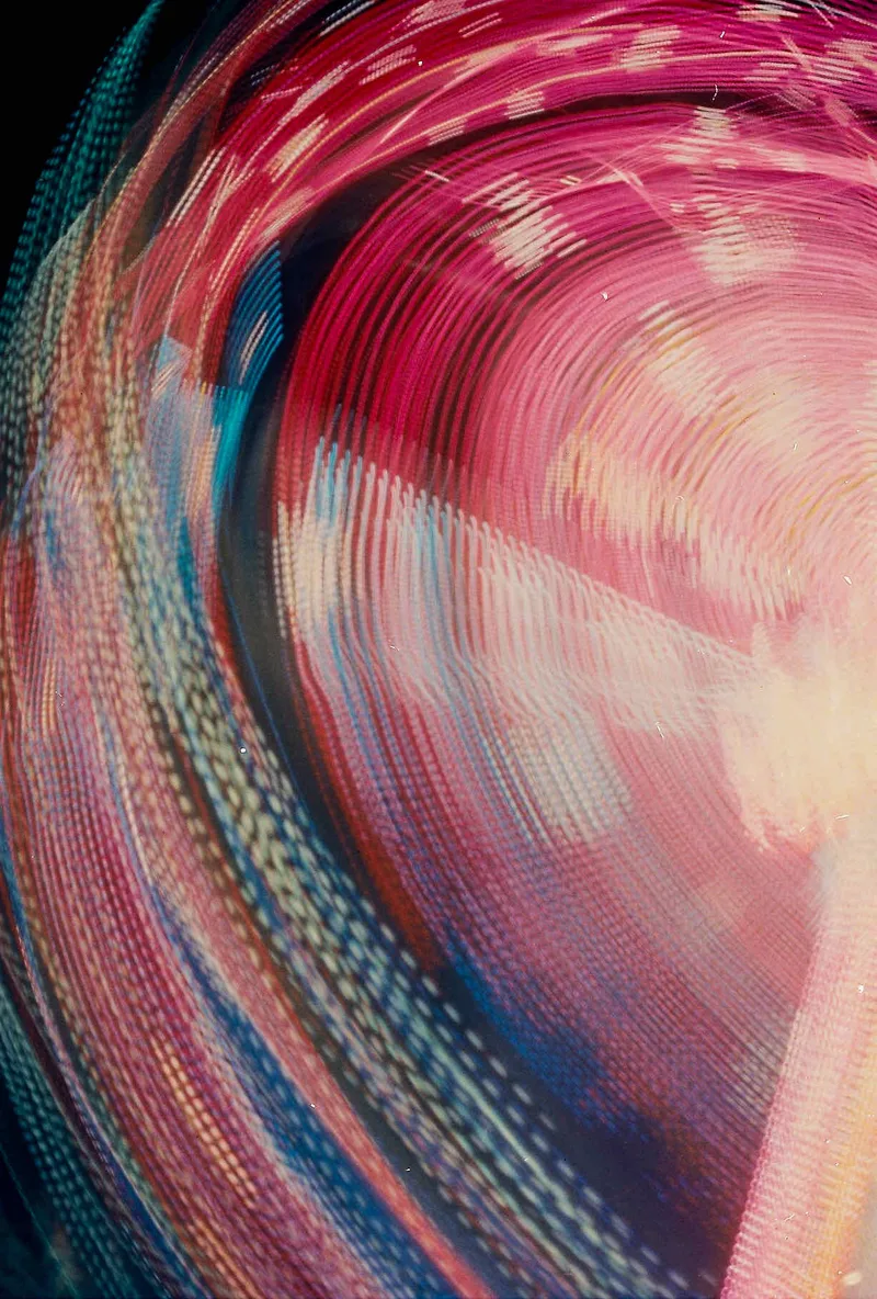 Caught in the spiral shot on Cinestill 800T with a Canon AE-1, developed at Labo Germain Photo, by Ambre