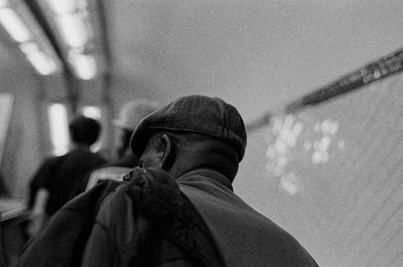 Dans l’escalator ⬆️ shot on Kodak Tri-X 400 with a Nikon N8008, developed at Nation Photo, by Léa Benatar
