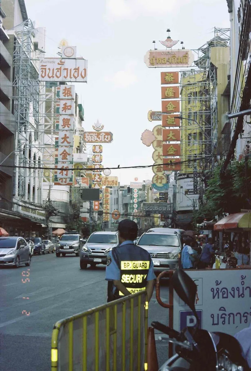 The conductor of chaos shot on Kodak Vision3 50D with a Fuji ZoomCardiaMulti2000OP, by Zane