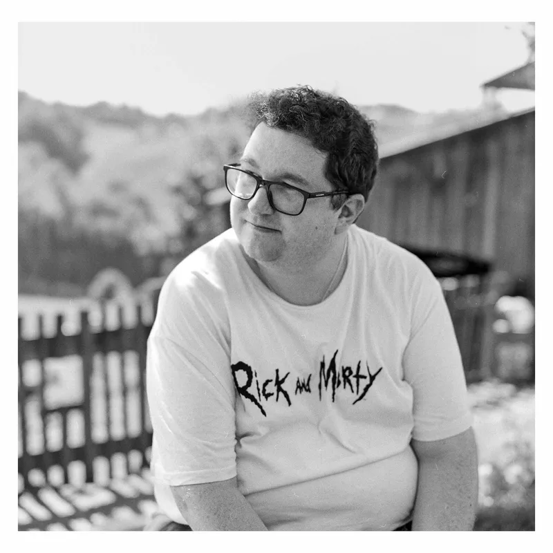 My husband on holiday shot on Ilford HP5 Plus 400 with a Hasselblad 500C, developed at Cyberlab, by Alexander Mailänder-Reautschnig