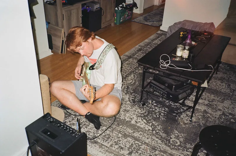 Droogan playing some tunes shot on Kodak Gold 200 with a Nikon L35AF, developed at Bleeker Digital Solutions, by bert jester