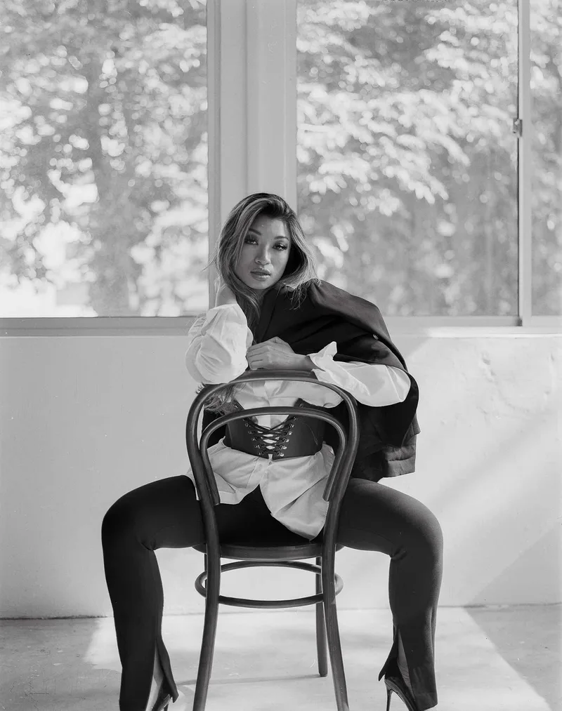 Naomi shot on Ilford HP5 Plus 400 with a Linhof MasterTechnika, developed at Home / Self-Developed, by Reggie