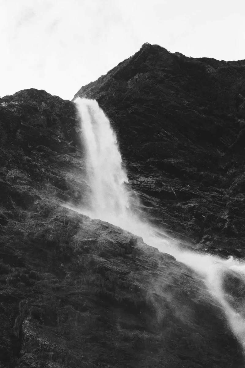 Milford Sound Waterfall shot on Rollei Infrared 400 with a Canon AE-1, developed at Fotofast