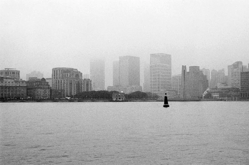 the bund shot on Ilford HP5 Plus 400 with a Leitz Leicaflexsl2, developed at Home / Self-Developed, by Jun Ma