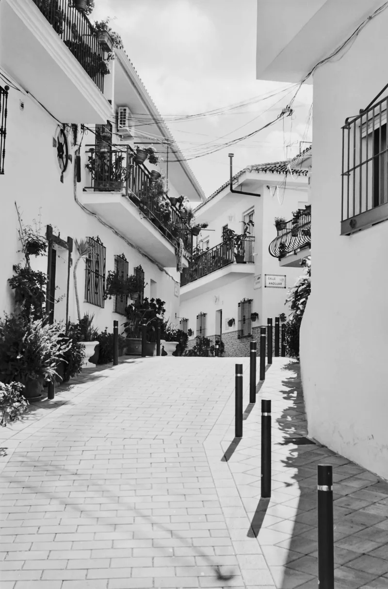 Avenues and Alleyways of old Benalmádena shot on Ilford XP2 Super 400 with a Canon L3, developed at Home / Self-Developed, by Mark Beadle