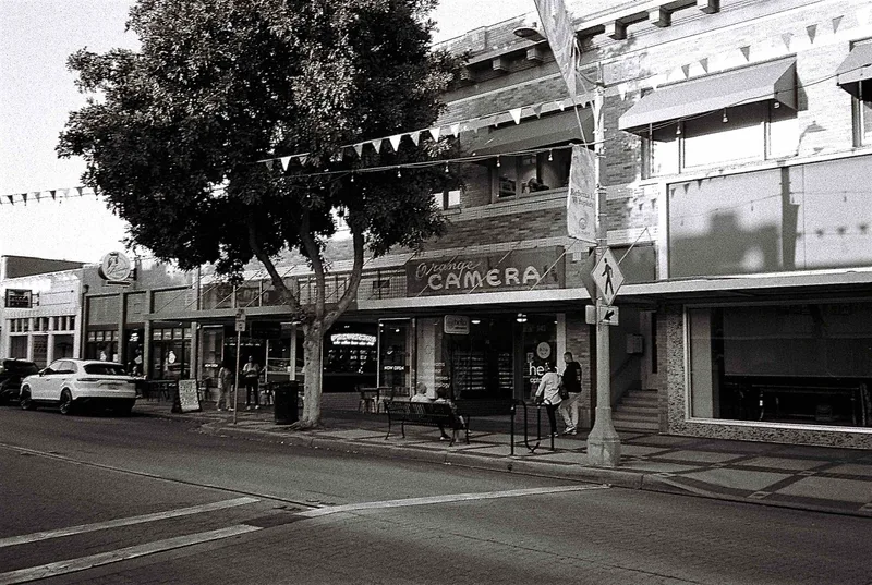 Old Camera Storefront shot on Ilford HP5 Plus 400 with a Olympus XA3, developed at The Photo Lab, by Clint