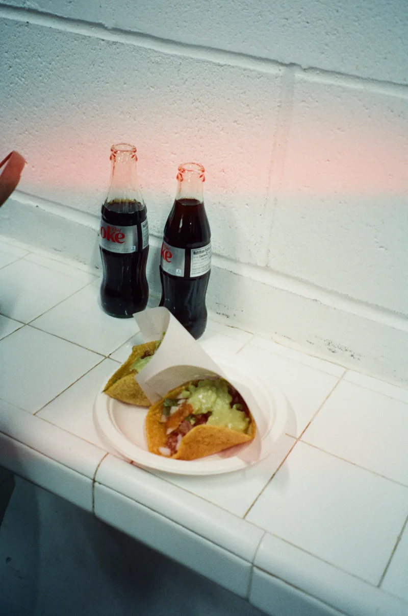 and eat tacos shot on Cinestill 800T with a Canon Sure Shot 70, developed at FilmDev, by Rich