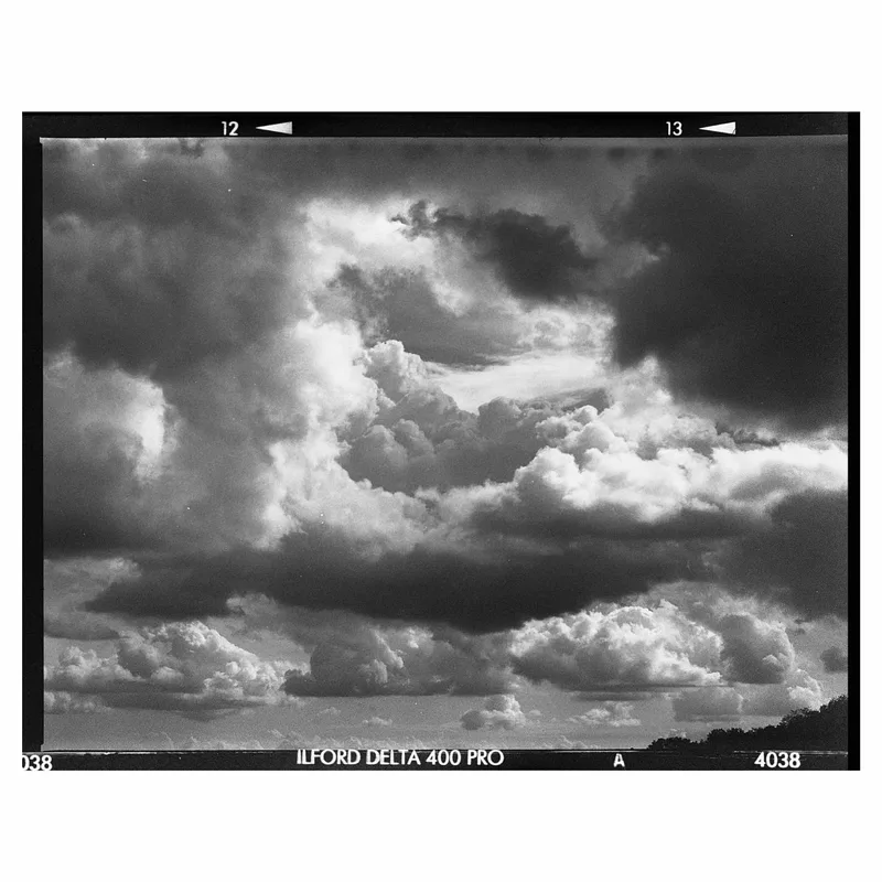 Cloudy and crazy days shot on Ilford Delta 400 with a Graflex Pacemaker Speed Graphic, developed at Home / Self-Developed, by Alessandro Benevento