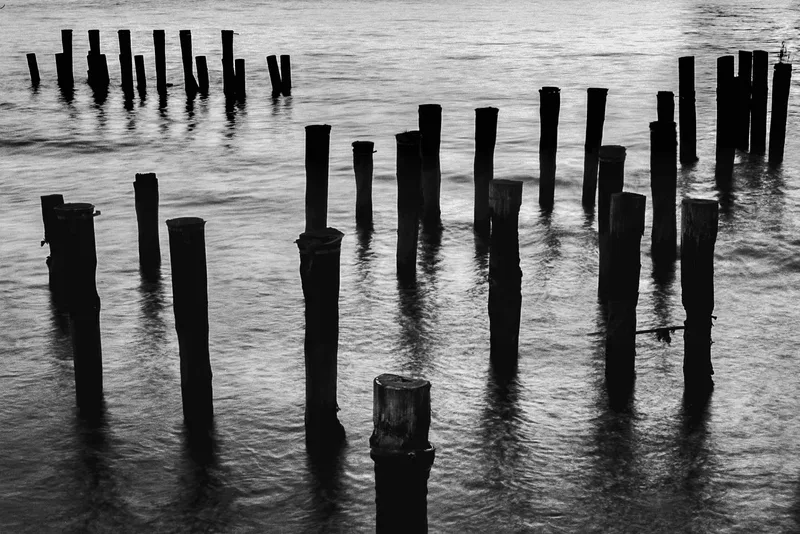 Pillars in Water shot on Fujifilm Neopan Acros 100 II with a Ricoh XR-2, developed at Exposure Therapy, by Joshua Timpko