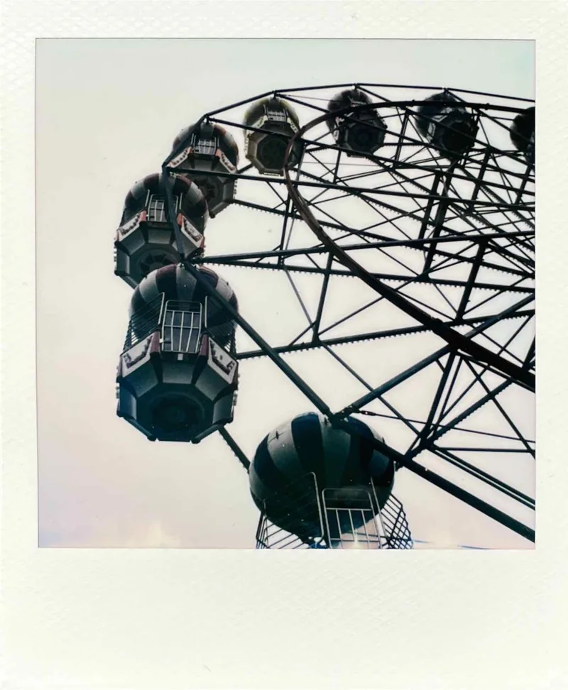 Fun of the fair 🎡 shot on Polaroid i-Type with a Polaroid I-2, by Guesty